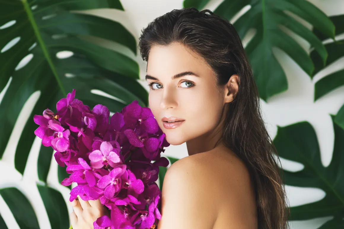 woman-with-flowers-posing-against-tropical-leaves-2026-03-10-00-01-45-utc-hostros-20
